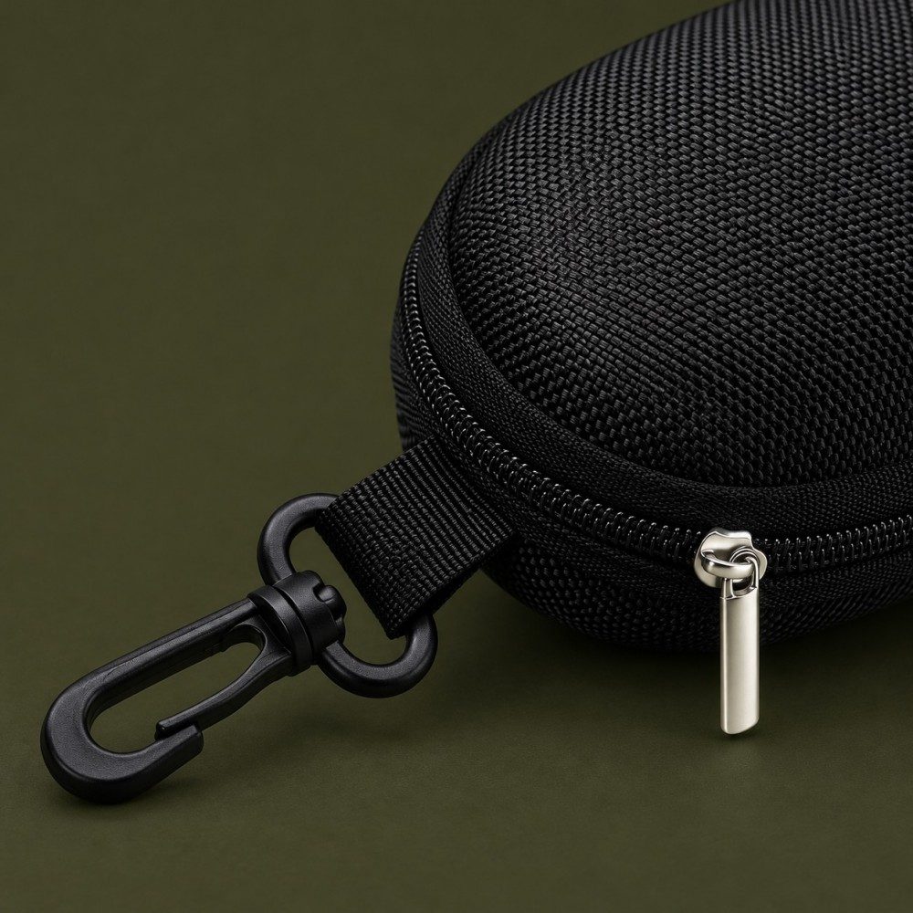 Open black EVA glasses case showing the lined clamshell interior and zip-around opening