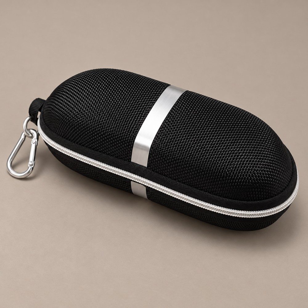 Black oval EVA glasses case with a silver accent band, light-colored zipper and metal carabiner