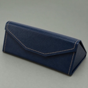 Deep navy foldable glasses case with contrast stitching, an angular magnetic flap and a triangular side panel.