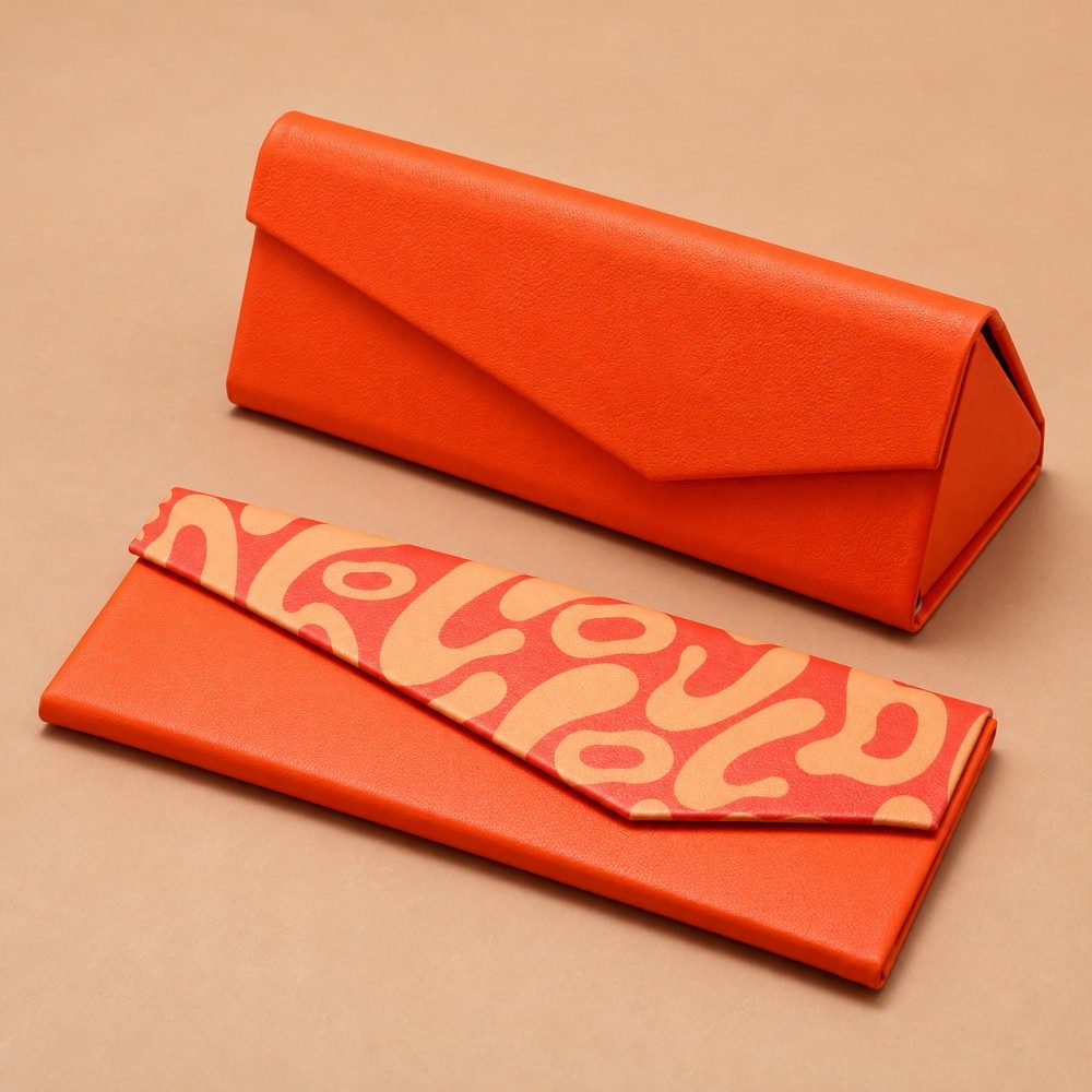 Open handmade glasses case showing black lining and inward-folding triangular side panels