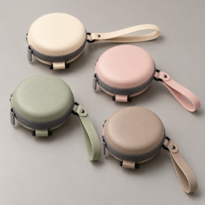 Ivory, blush pink, sage green and taupe color concepts for round EVA folding sunglasses cases