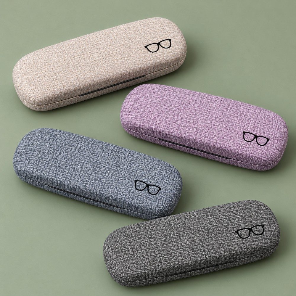 Four rounded PU glasses cases in beige, lavender, blue-gray and dark gray on a muted green background.