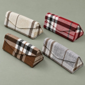 Four triangular folding sunglasses cases in ivory, red, brown and gray woven plaid patterns.