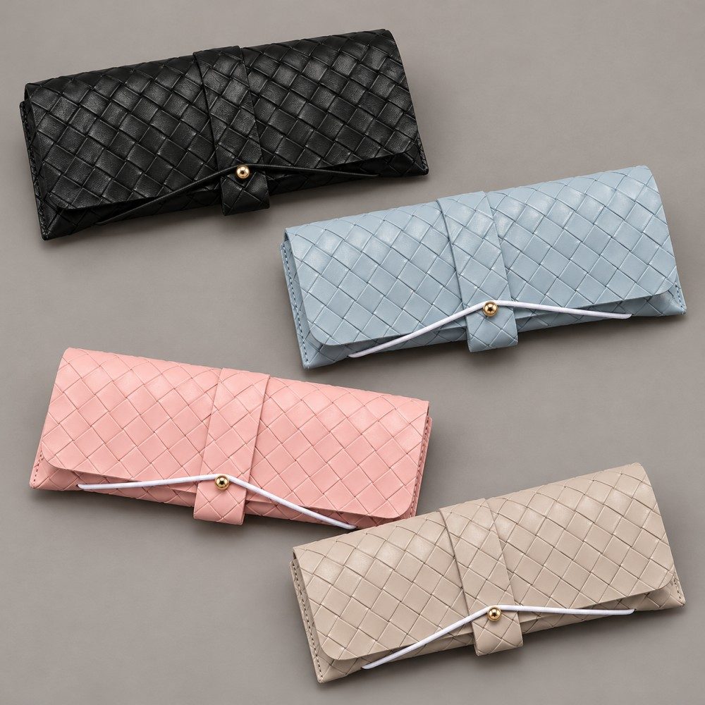 Basket-weave textured eyewear cases in black, light blue, pink and milk-tea beige with cord-and-stud closures.