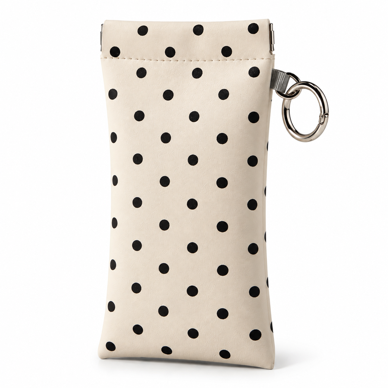 Ivory squeeze top eyeglass pouch with black polka dots and a silver clip ring