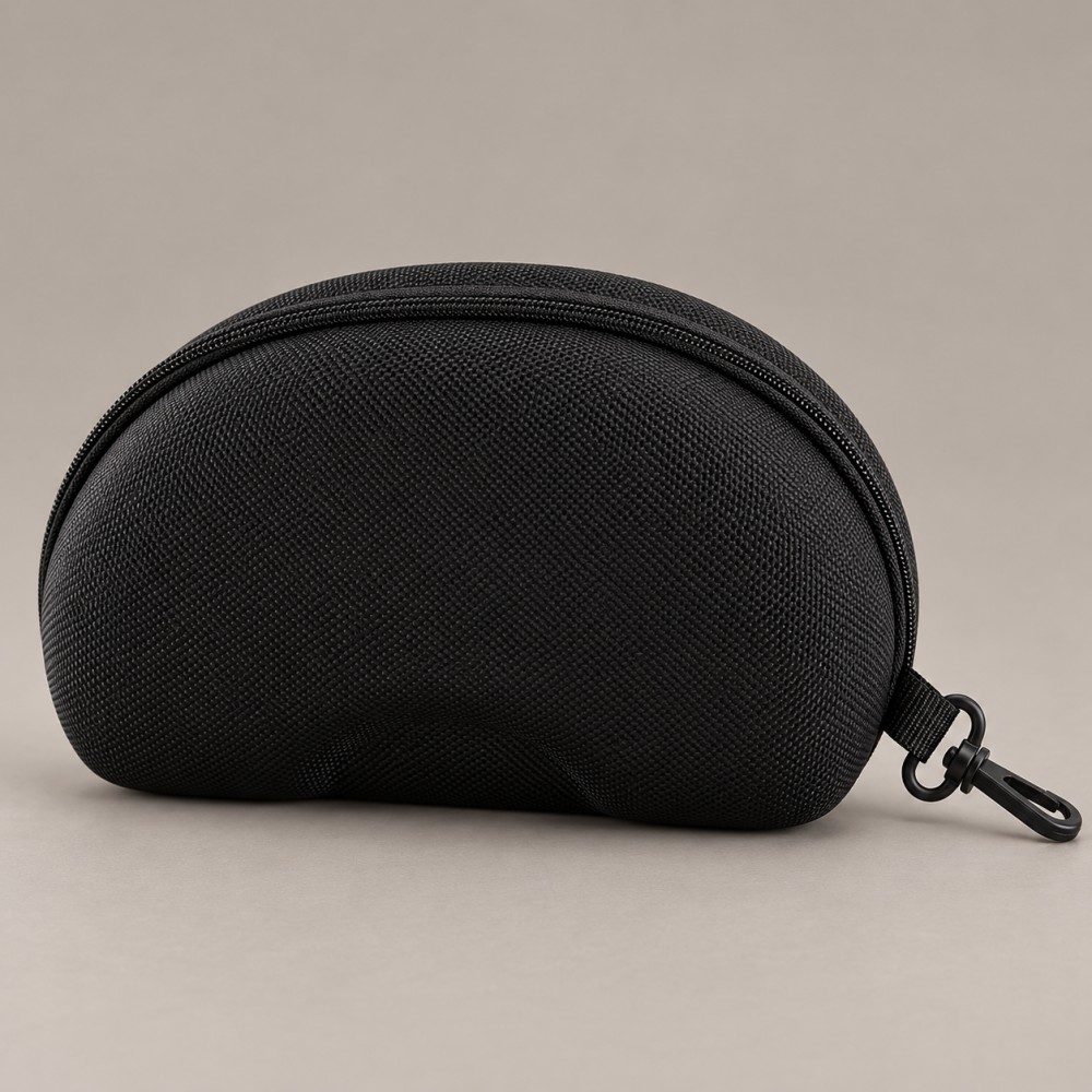 Large black EVA sunglasses case with a textured exterior, perimeter zipper and side swivel clip on a taupe background.