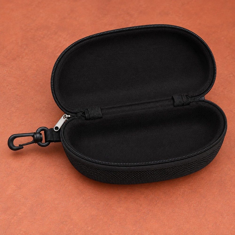 Open black EVA glasses case showing the lined clamshell interior and zip-around opening