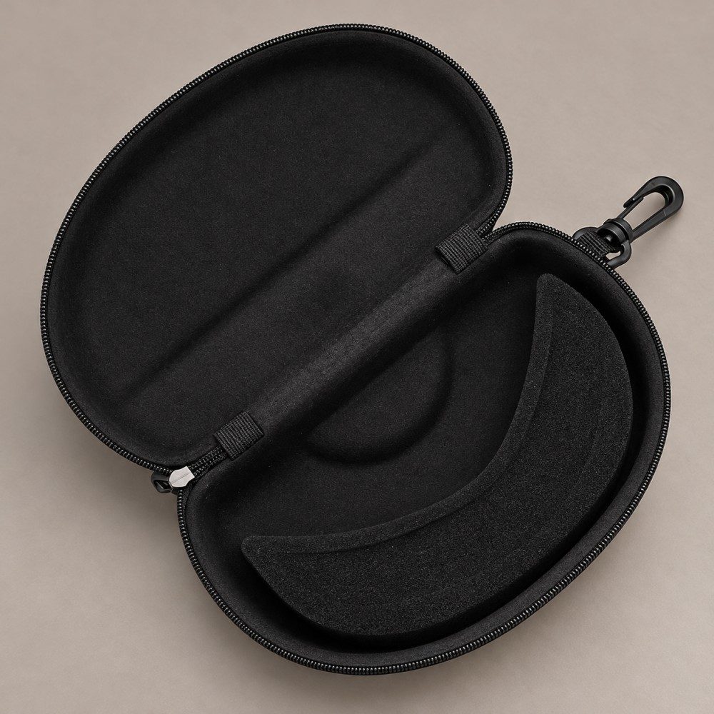 Open black EVA sunglasses case showing the lined clamshell interior, curved insert, perimeter zipper and side swivel clip.