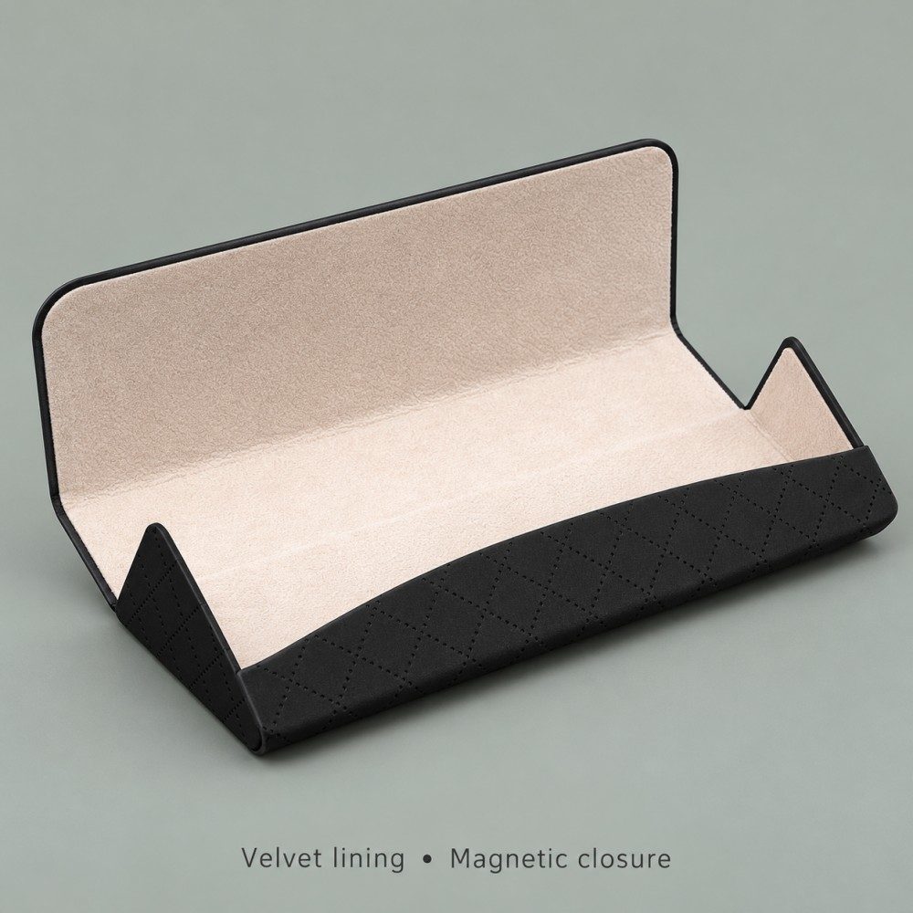 Open black magnetic glasses case showing light beige velvet lining, shaped end panels and a wide flap.