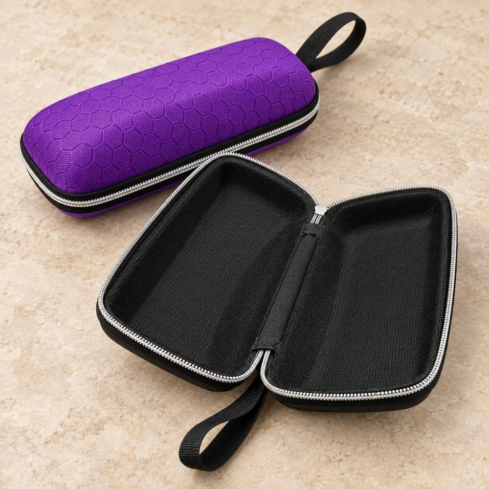 Open EVA sunglasses case showing black fabric lining and zip-around construction