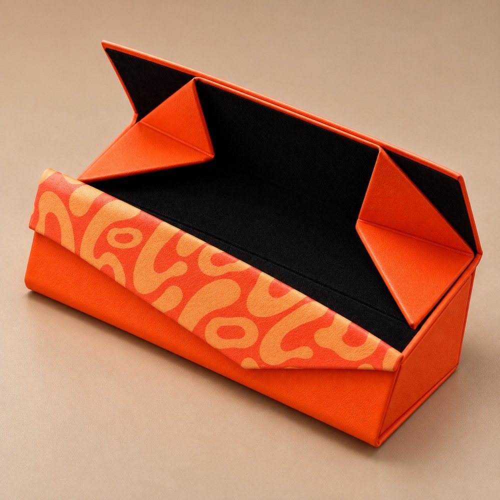 Folding glasses case shown assembled and folded flat in orange finishes