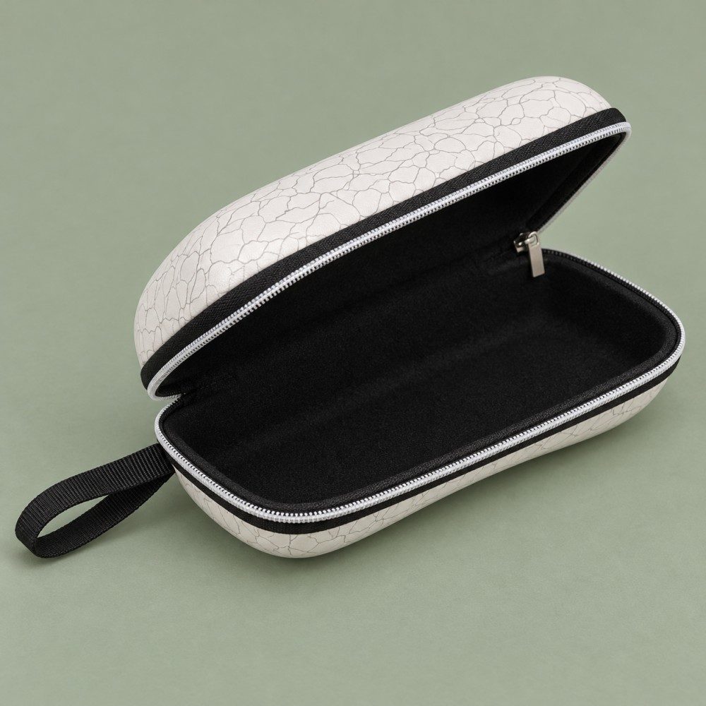 Open EVA sunglasses case showing its black fabric lining, zipper closure and webbing loop