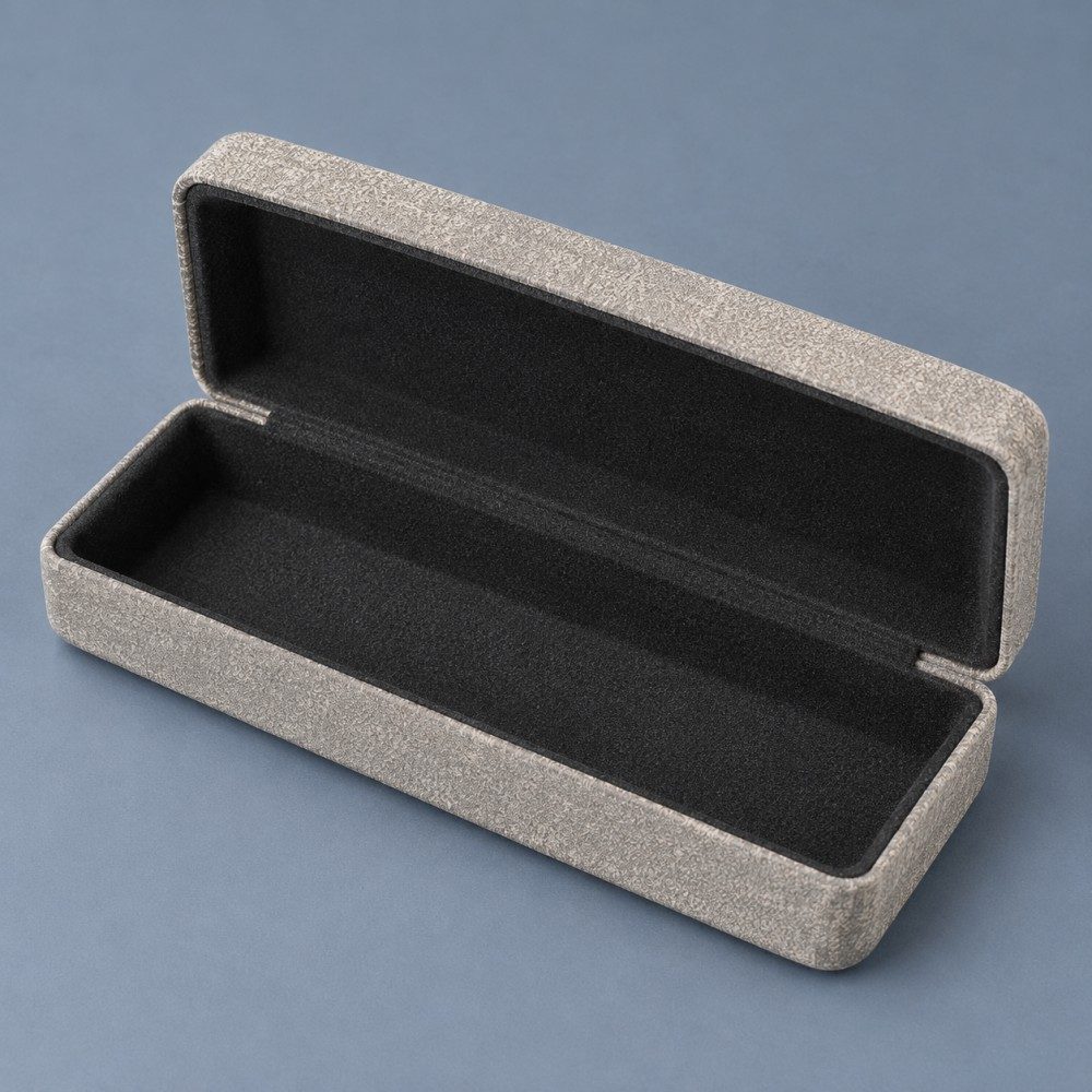Open gray hinged glasses case showing black flocked lining inside the lid and base.