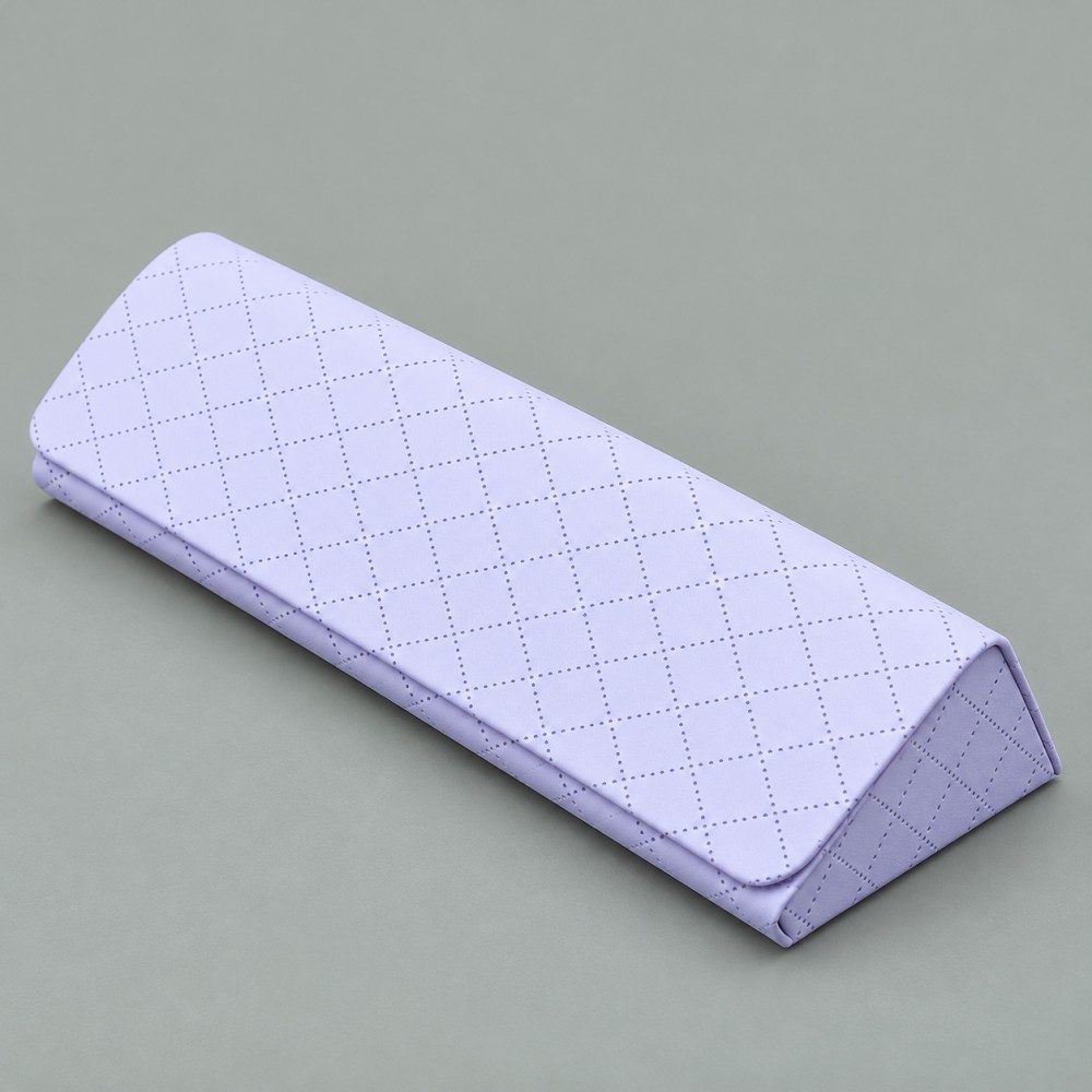 Lavender magnetic glasses case with a dotted diamond pattern, rounded flap corners and a triangular side profile.