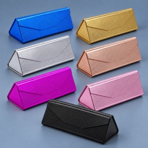 Seven triangular foldable sunglasses cases in blue, gold, silver, rose gold, magenta, light pink and black.