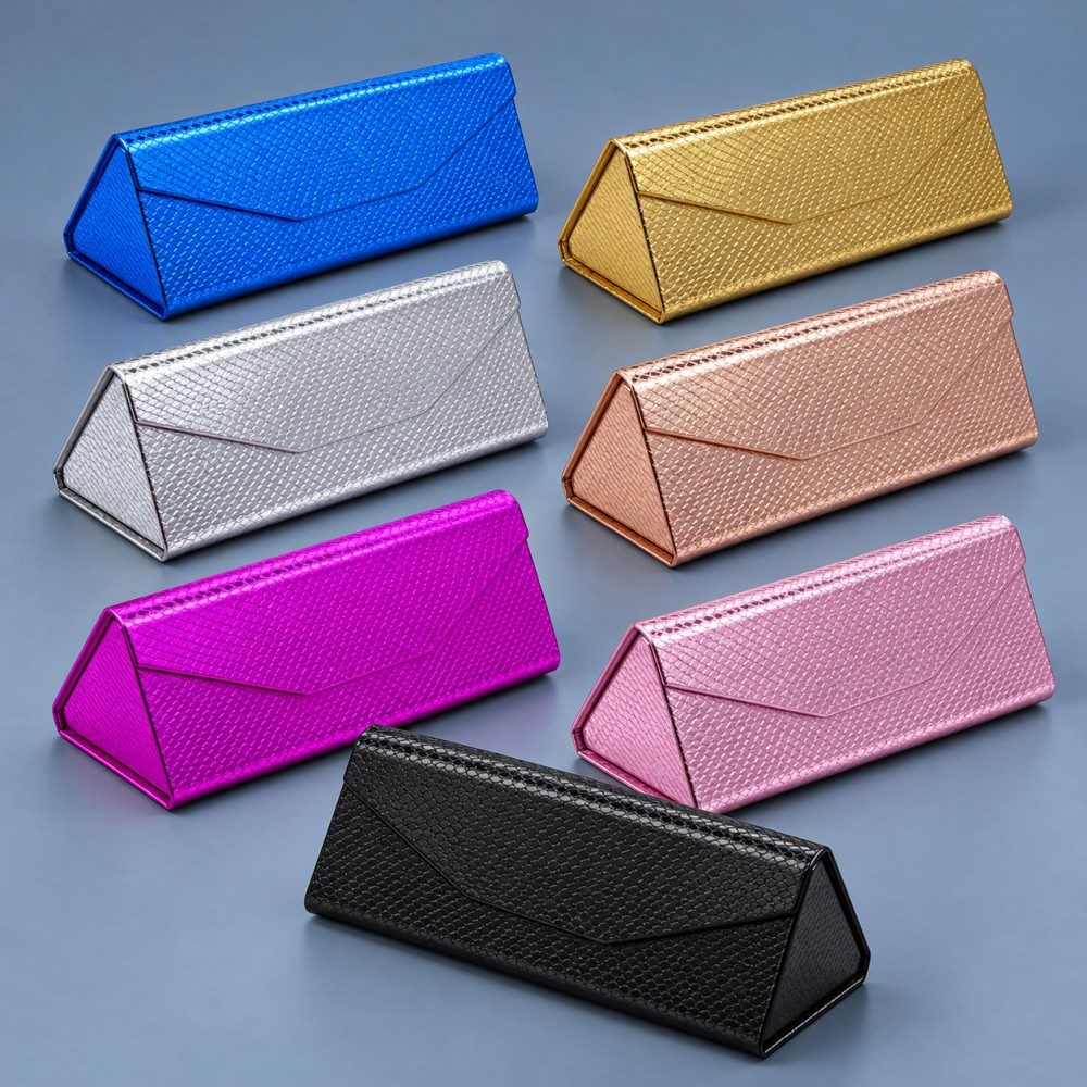 Seven triangular foldable sunglasses cases in blue, gold, silver, rose gold, magenta, light pink and black.