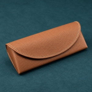Brown custom leather glasses case in PVC faux leather with a rounded magnetic flap