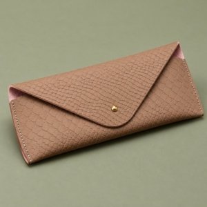 Brown embossed leather glasses pouch with an envelope flap and gold-tone stud
