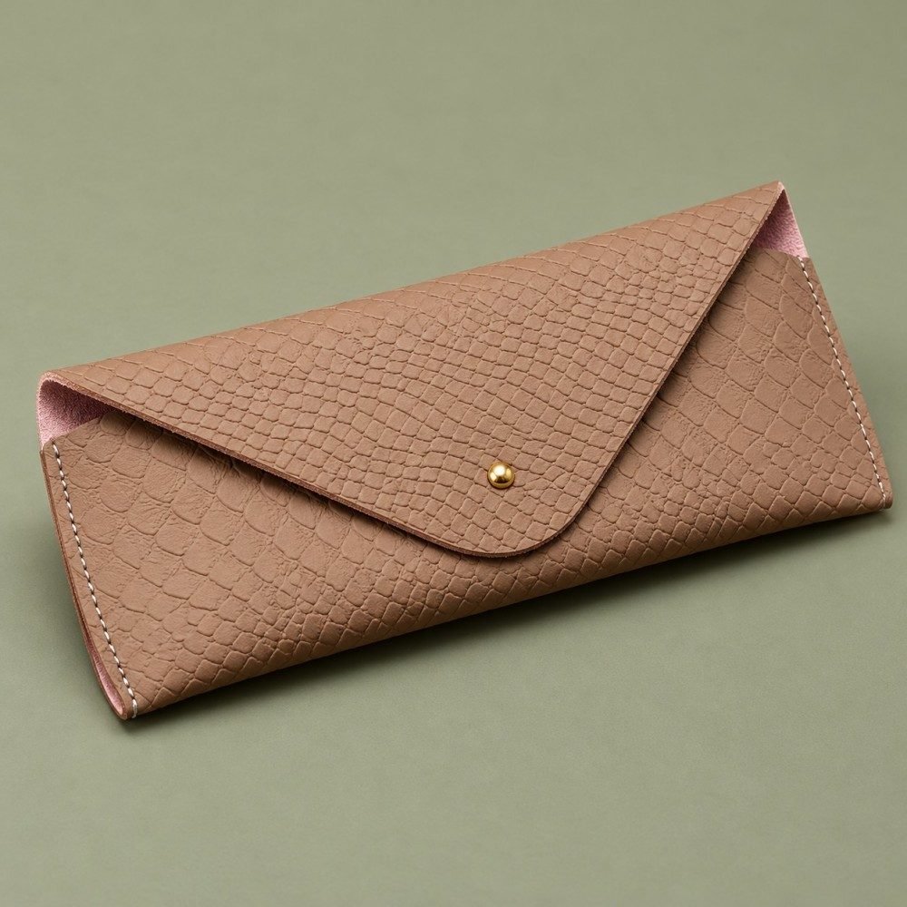 Brown embossed leather glasses pouch with an envelope flap and gold-tone stud
