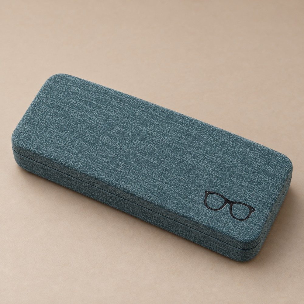 Gray-blue rectangular glasses case with a textured cover and small eyeglasses graphic on a warm beige background.
