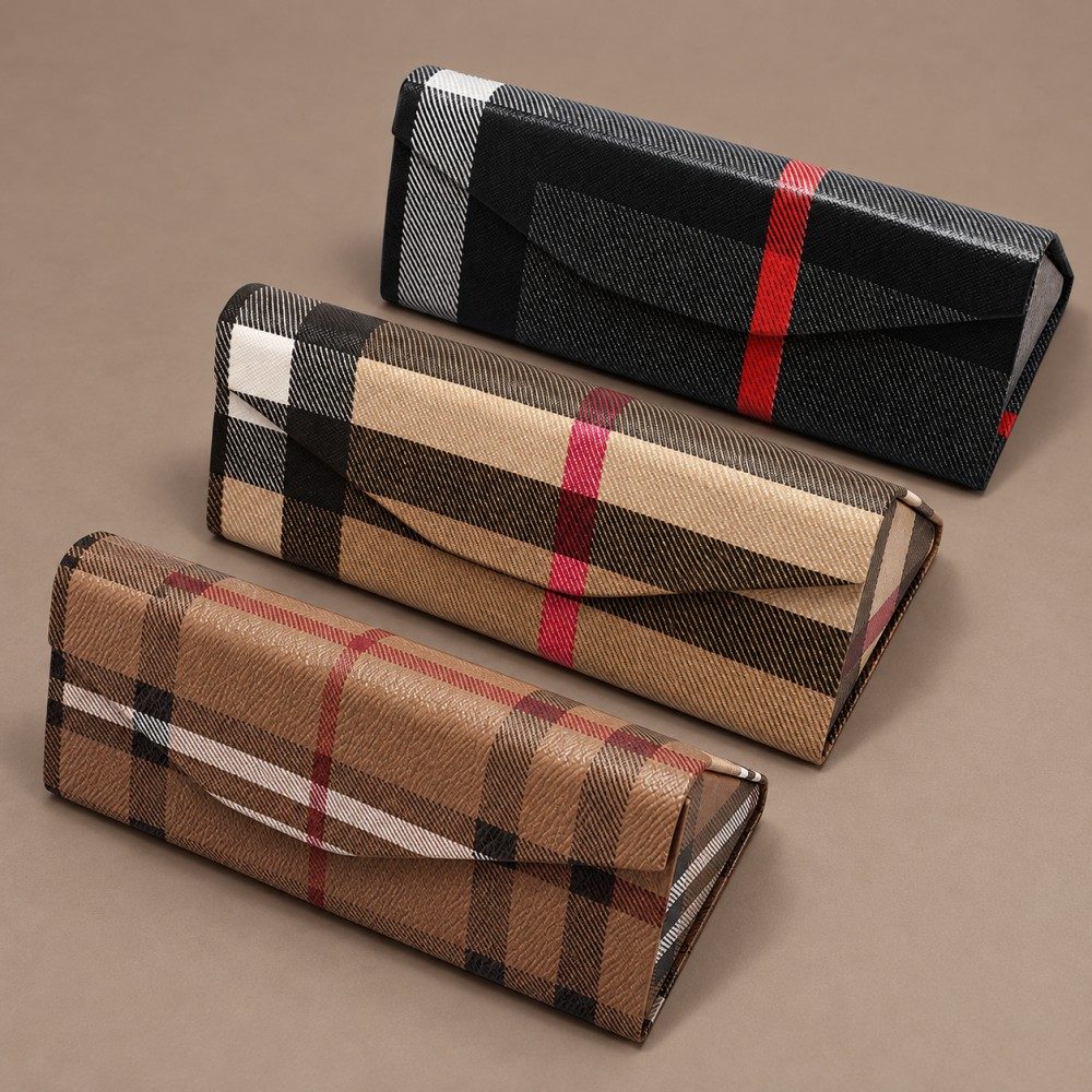 Three plaid folding glasses cases in coffee brown, milk tea beige and black-grey with matching triangular shapes.