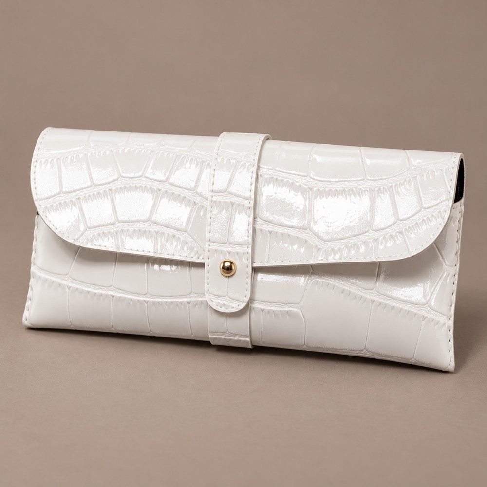 White soft sunglasses case with glossy crocodile-pattern embossing, a rounded flap and a central gold-tone button-stud strap.